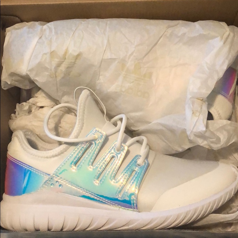 Adidas- kids 4 woman’s 6. Basically new !